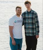 Founders Collin and Will of Child Care Web Design standing by a lakeside, committed to helping childcare centers grow enrollments with custom websites.